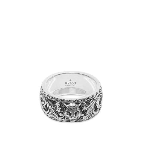 gucci ring feline heads ruby tsavorite